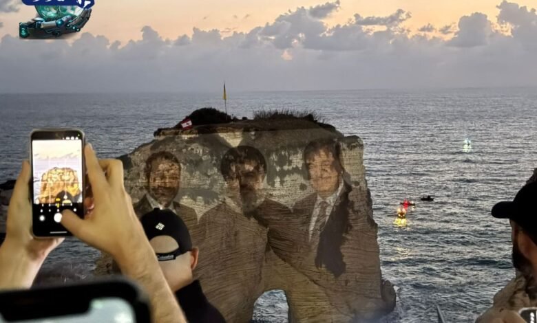 اضاءة صخرة الروشة بصورة الشهيدين الحريري ونصرالله 1